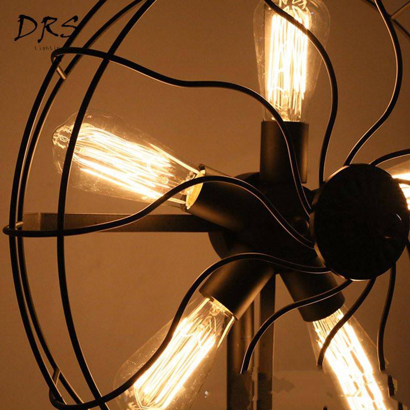 Lampadaire tripode style industriel avec 5 lampes dans cage