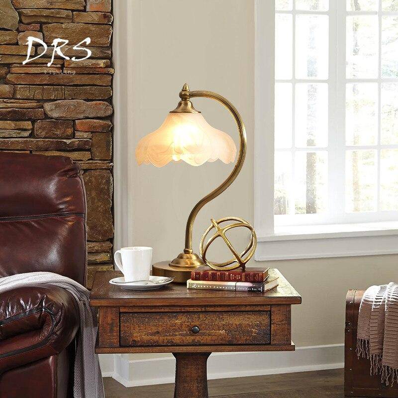 Gold table lamp with lampshade in glass Copper