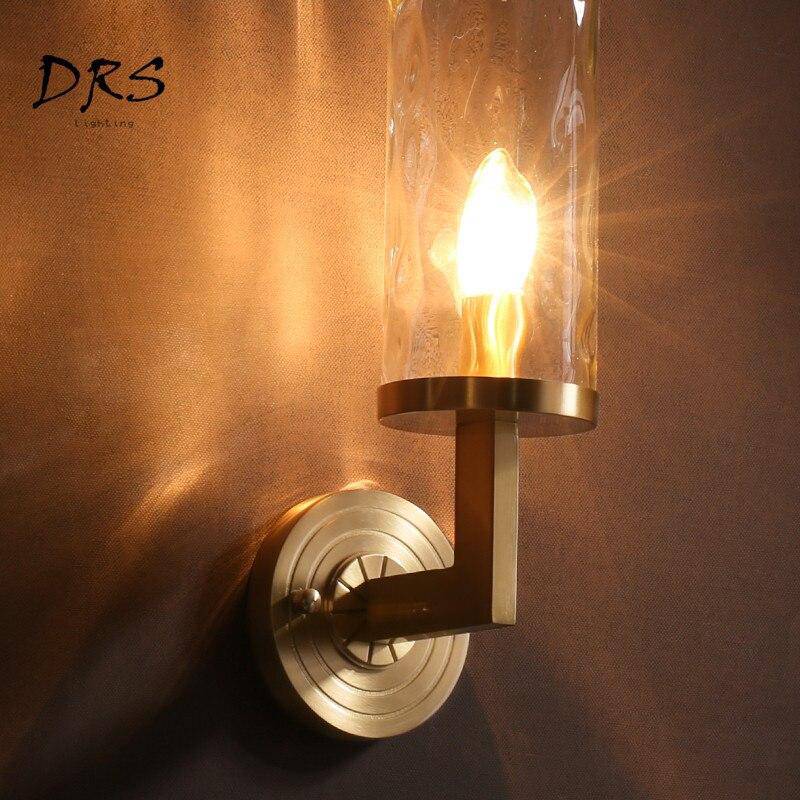 Applique murale doré avec abat-jour en verre cylindrique