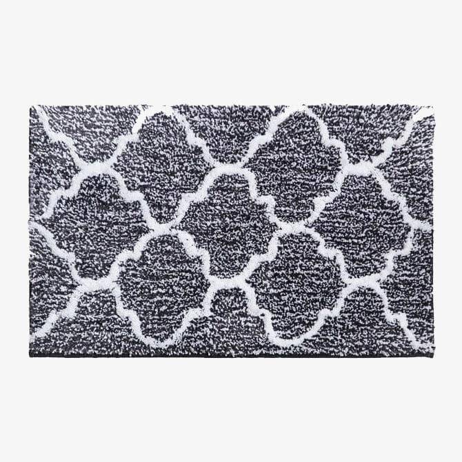 Rectangular coloured microfibre bath mat with Moro pattern