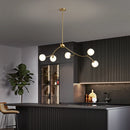 lustre de restaurant en cuivre design ambiance moderne pour intérieur