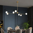 lustre de restaurant en cuivre design ambiance moderne pour intérieur