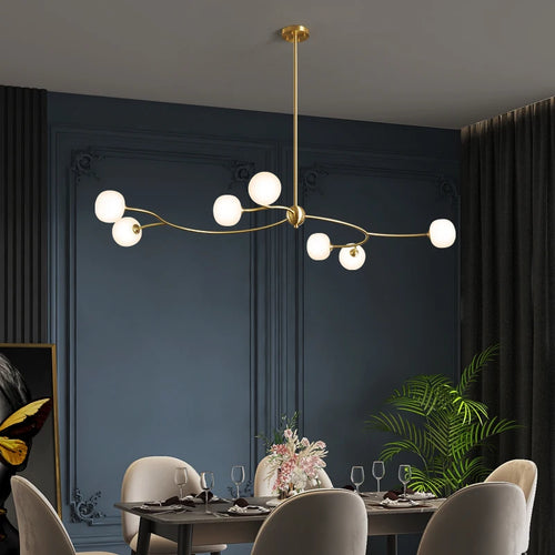 lustre de restaurant en cuivre design ambiance moderne pour intérieur