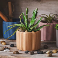 moule à pot de fleurs en béton à rayures et en silicone