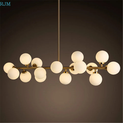 lustre design en métal doré et lampes en boules