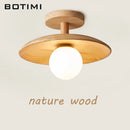 Plafonnier rond en bois arrondi design scandinave