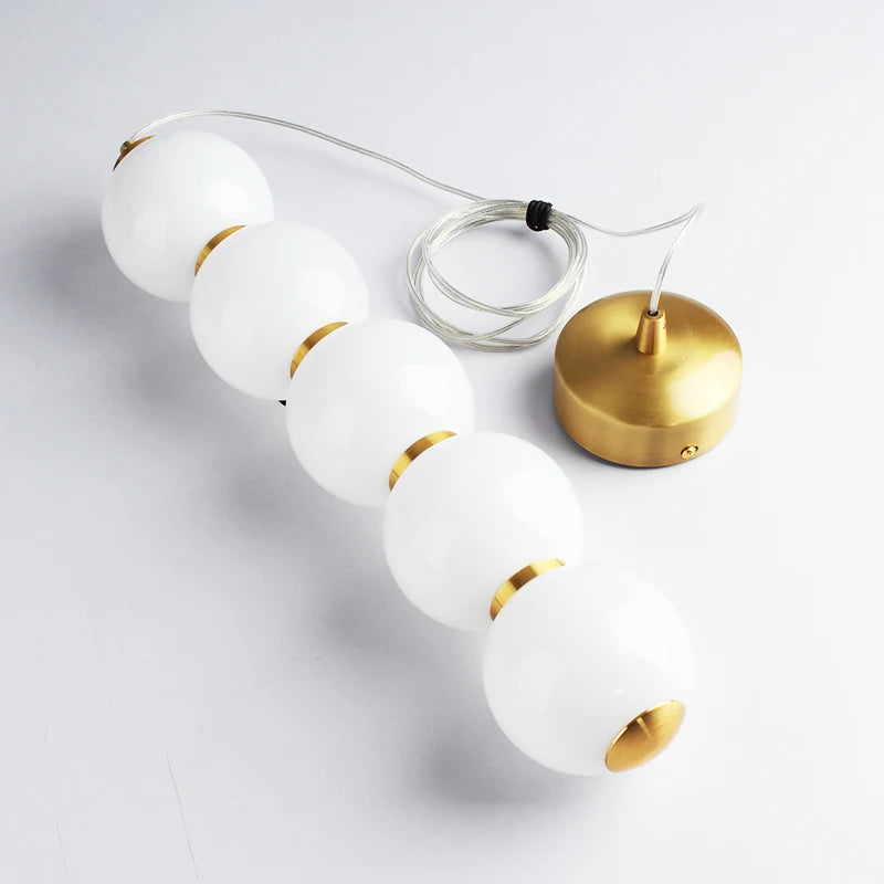 Suspension design à led boule verre or brillant