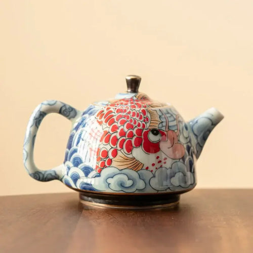Théière chinoise porcelaine décor sous couverte infuseur