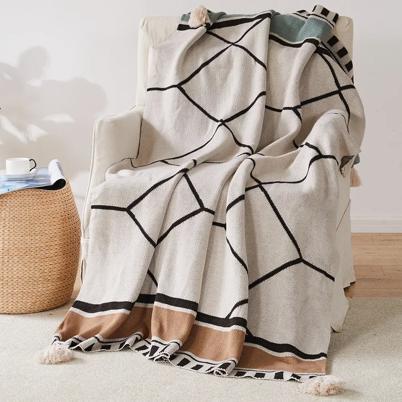 plaid tricoté bohème à rayures avec pompons doux