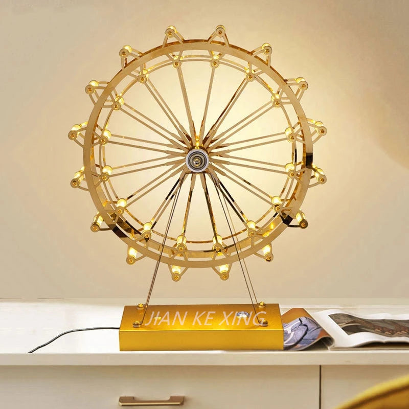 lampe de table rotative led grande roue en acier inoxydable - vue 3 sur 11