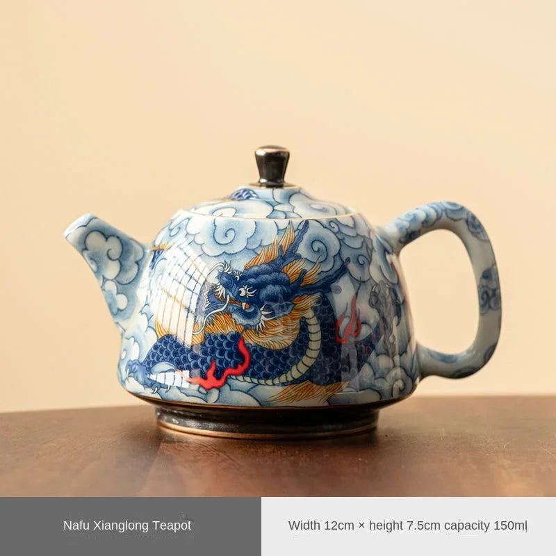 Théière chinoise porcelaine décor sous couverte infuseur