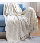 plaid tricot léger doux pompons style cosy salon
