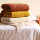plaid tricoté uni style moderne pour canapé lit