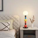 lampadaire moderne à perles colorées et abat-jour en verre
