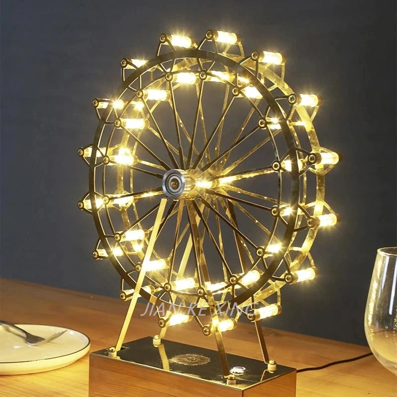 lampe de table rotative led grande roue en acier inoxydable - vue 5 sur 11