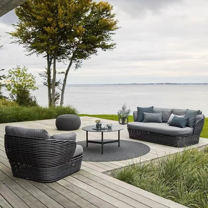 canapé extérieur en teck avec table basse et lit