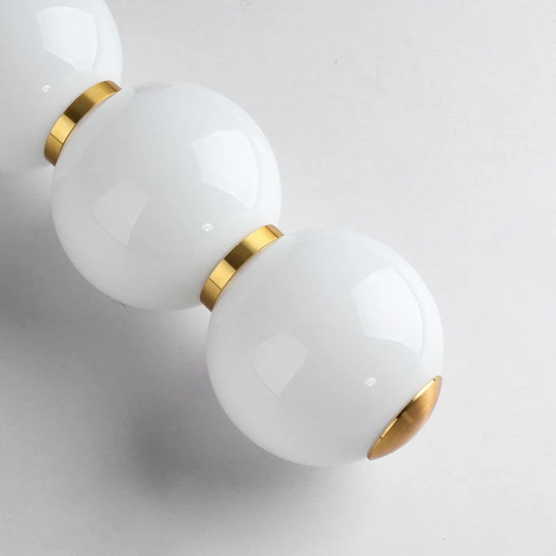 Suspension design à led boule verre or brillant