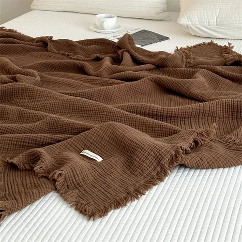 Plaid coton pompons carreaux salon chambre doux