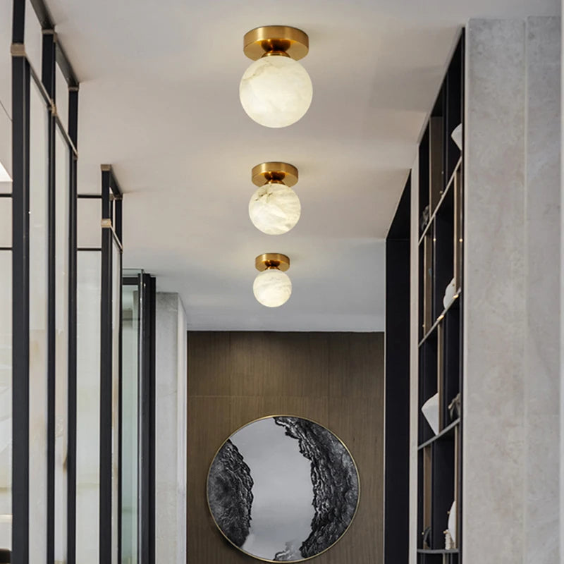 plafonnier marbre nordique intérieur cuisine allée hall escalier en laiton
