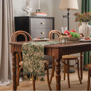 Chemin de table jacquard vert motif floral pompons