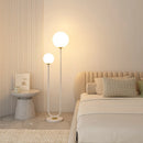 lampadaire en métal avec 3 gradations verre simple