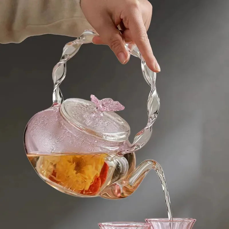 Théière verre borosilicate poignée articulée fonction papillon