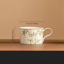 Mug en porcelaine style chinois fleuri avec cuillère