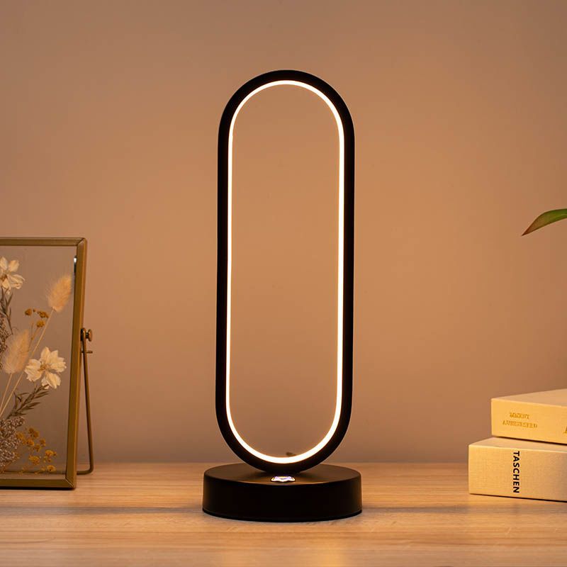 LED table lamp with metal ring, Arpa design