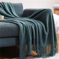 plaid tricot nordique doux avec pompons pour canapé