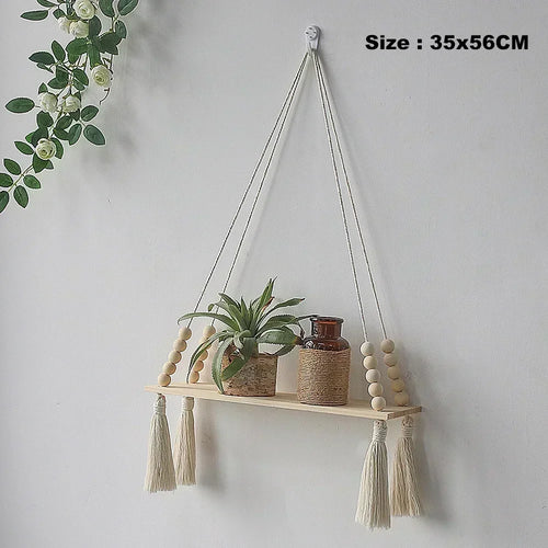 balançoire murale en corde et bois pour décoration nordique