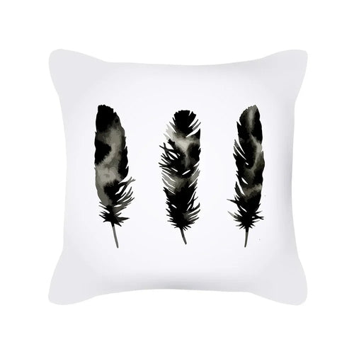 housse de coussin noire et blanche motif géométrique moderne