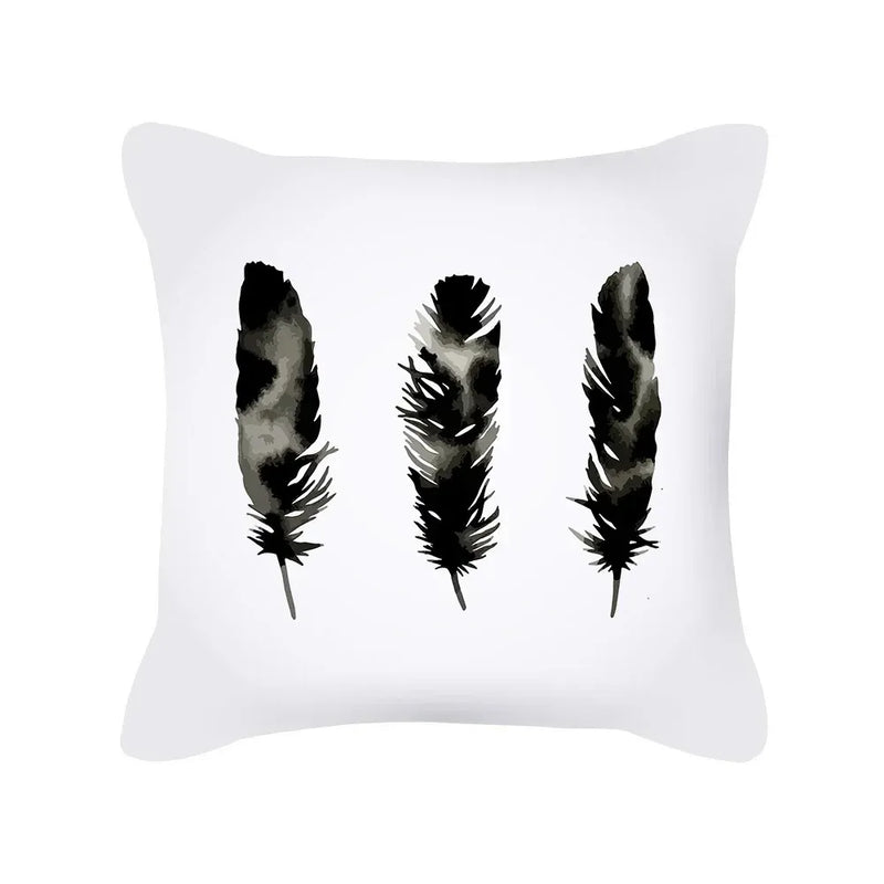 housse de coussin noire et blanche motif géométrique moderne