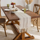 Chemin de table bohème beige tissé pompons géométriques
