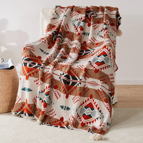 plaid tricoté géométrique bohème avec pompons doux chaud