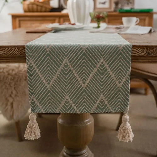 Chemin de table géométrique bohème beige à pompons