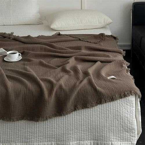 Plaid coton pompons carreaux salon chambre doux