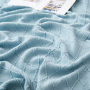 Plaid tricoté jacquard à pompons style nordique décoratif
