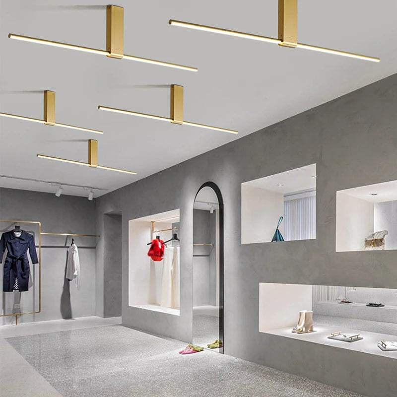 lampes de plafond minimalistes longues pour divers espaces