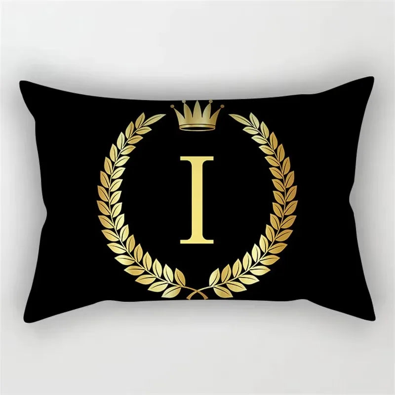 housse de coussin décorative motif lettres noires et dorées