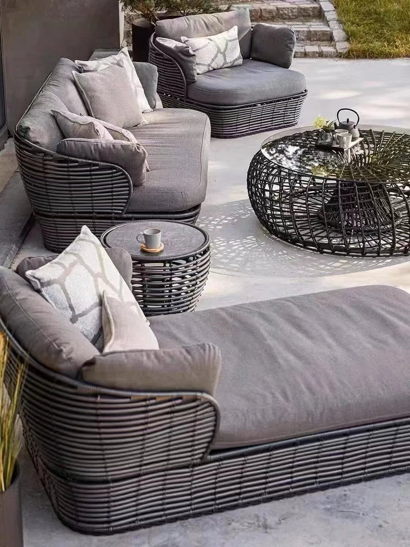 canapé extérieur en teck avec table basse et lit