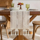 Chemin de table bohème beige à pompons géométriques