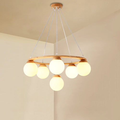 suspension en bois avec boule de verre design moderne