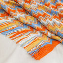 plaid bohème tissé à pompons style carreaux canapé