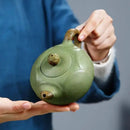 Théière chinoise en argile yixing motif lotus artisanale