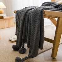 Plaid grosse maille gaufrée avec pompon style nordique