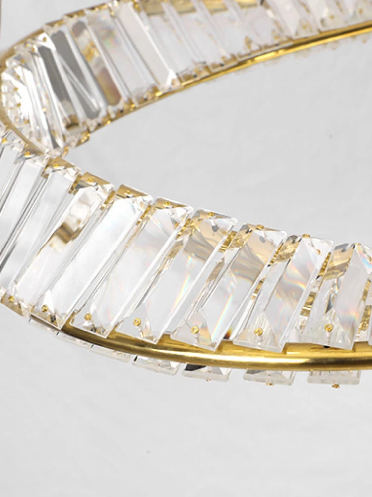 lustre décoratif circulaire en cristal et acier inoxydable