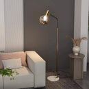 lampadaire doré et noir en métal et verre élégant