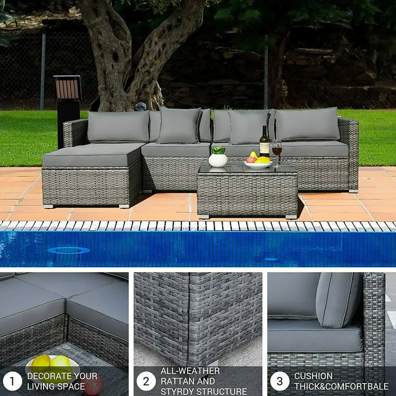 ensemble de canapés dangle de jardin en rotin avec table basse et coussins