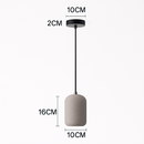 Suspension design cylindrique en ciment façon terrazzo LED