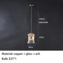 suspension-moderne-en-verre-transparent-avec-d-tails-en-bois-et-cuivre-9.png